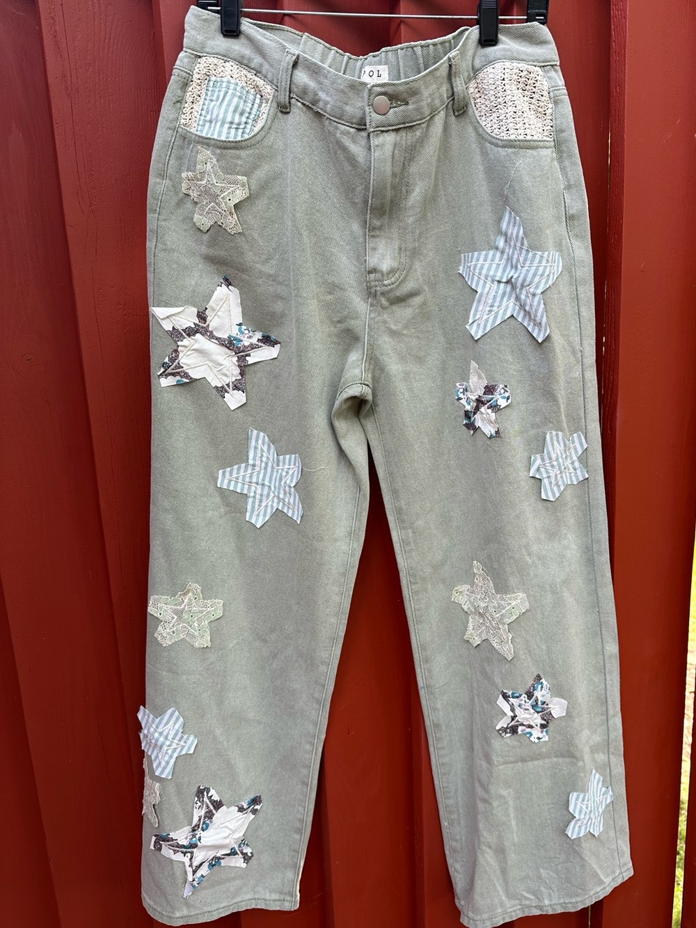 POL pants Size L NWOT. Adorable patches on these pants!
